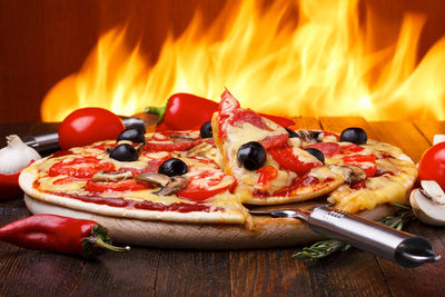 2015 in Pizza: Pizza Saves Lives, Pizza Rat, and So Much More