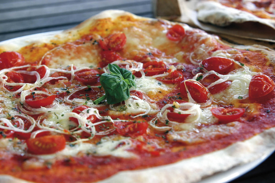 Forget Corn-hole and Beer Pong, Outdoor Pizza Ovens Are The New Barbecue Trend