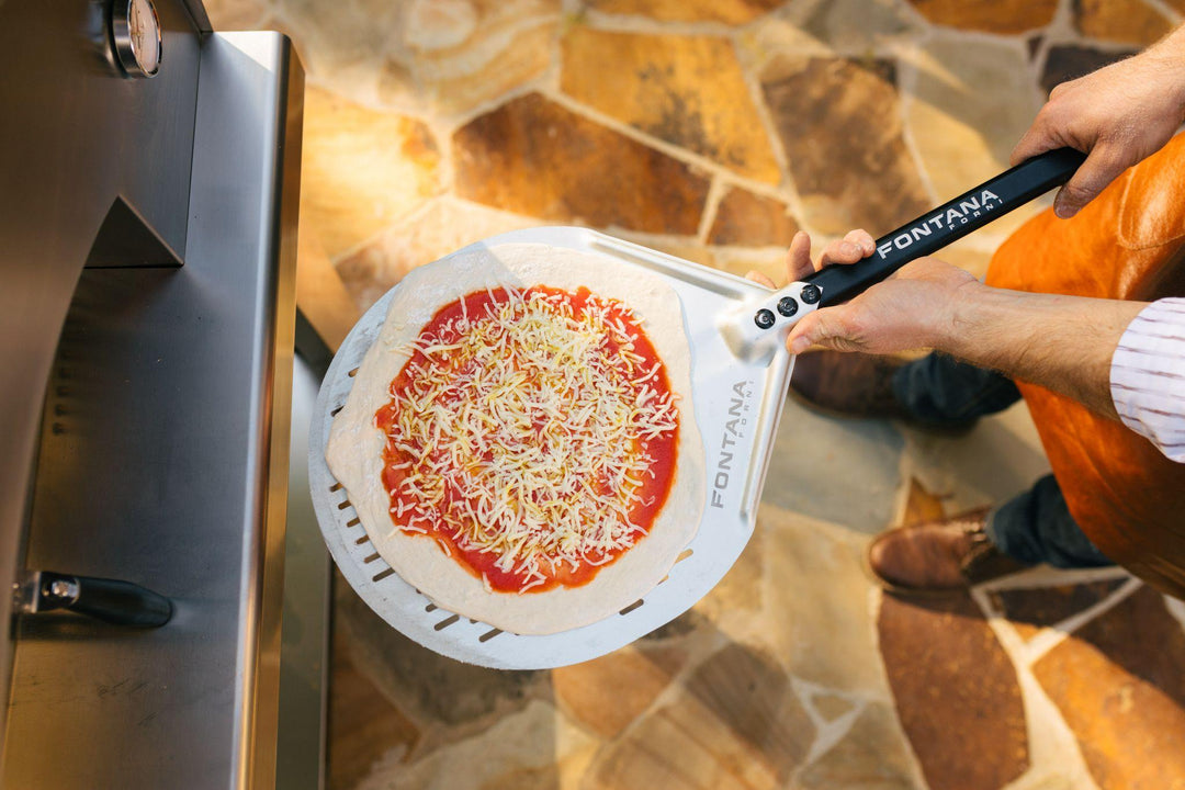 Raw pizza on the baking pan