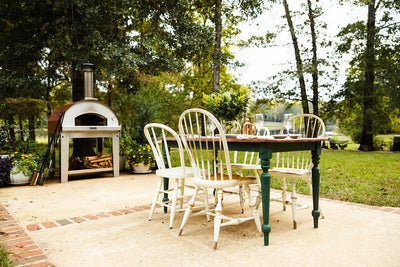 Marinara Wood-Fired Oven Next to an Outdoor Table #color_gray