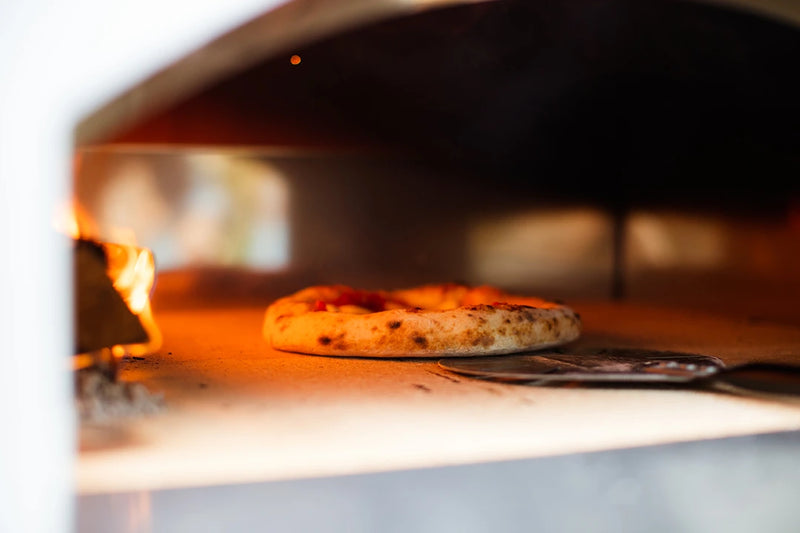 Pizza Inside a Marinara Wood-Fired Oven 