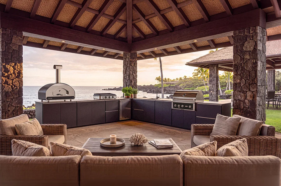 Fontana Forni USA Ember Outdoor Kitchen with a Volta 90, Fridge, sink and 42inch grill all on a tropical patio