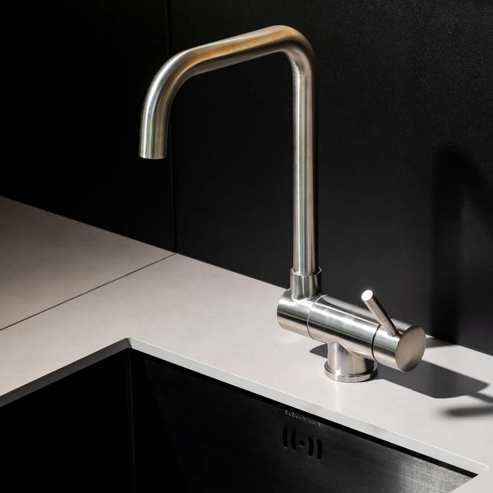 Close up of silver sink over under-mount sink and light countertop of Elysia Sink Module