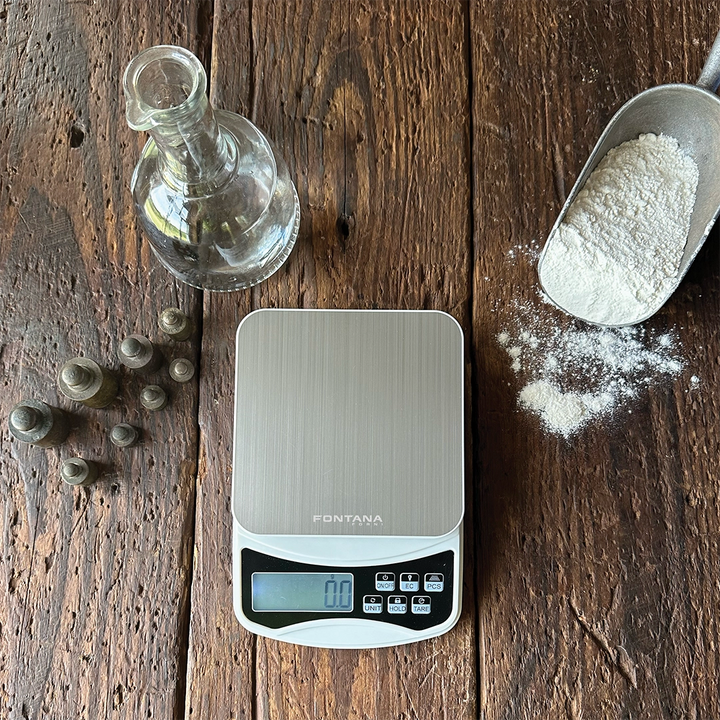 Fontana Precise Digital Scale - on table with weights and flour in scoop