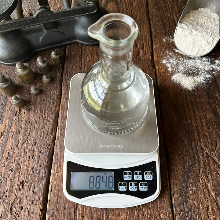 Fontana Precise Digital Scale - on table with weights, flour in scoop and liquid jar