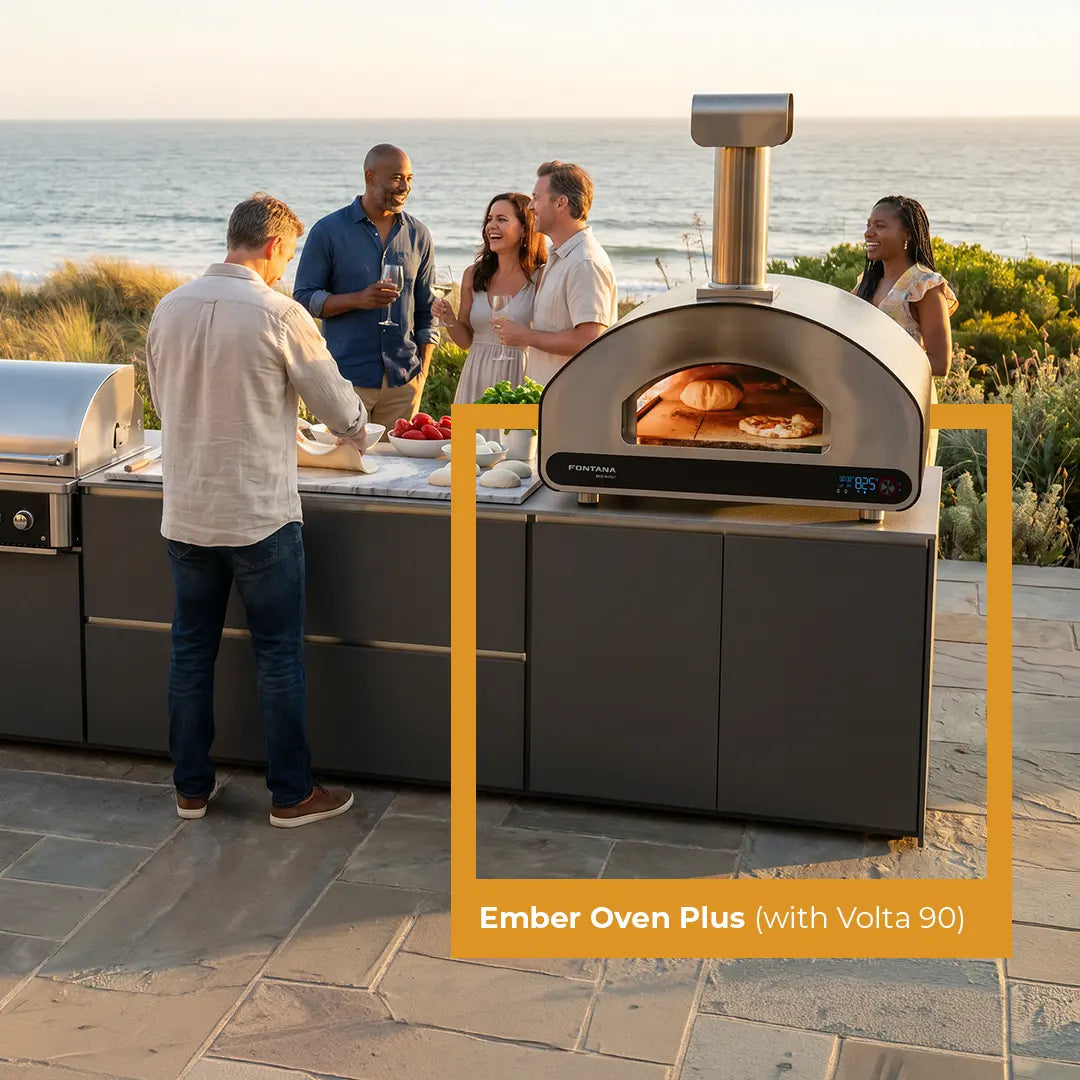 People on the coast with a Fontana Ember outdoor modular kitchen showing the Ember Oven Plus and Volta Smart Oven