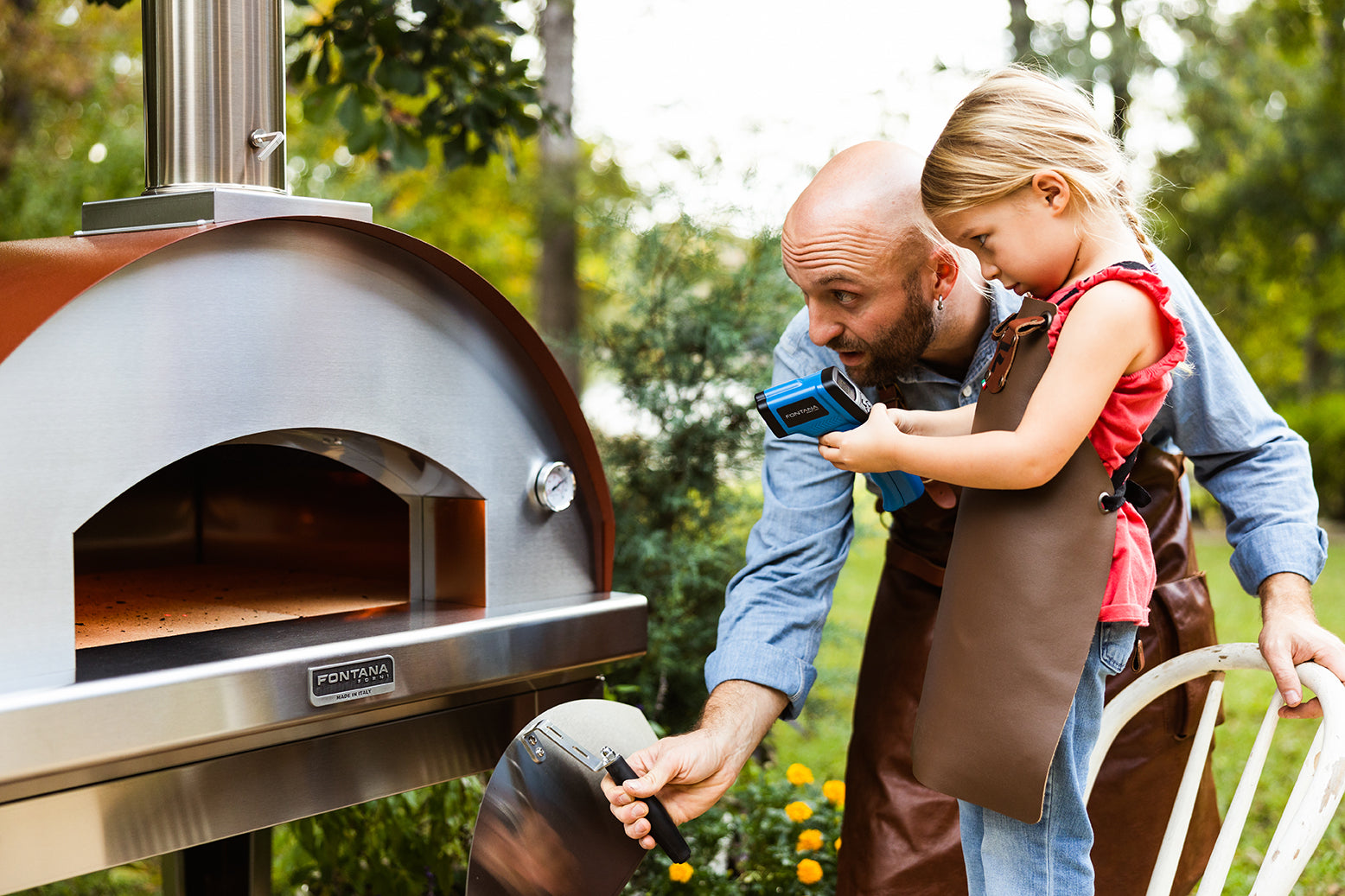 Infrared Thermometer Being Aimed Inside an Oven
